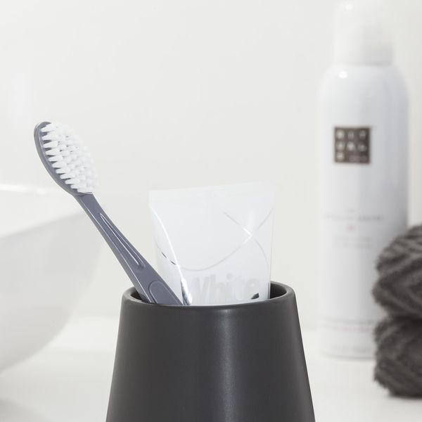 Conical tannglass svart